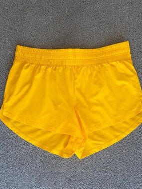 DSG Women's High Rise Athletic Shorts- University Gold color